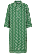 Buy Online Beth Wavy Dress Alice Collins Green Pepper dress with white wavy pattern on a white background