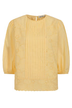 Buy Online Imogen Blouse Alice Collins Yellow blouse with intricate designs on a white background